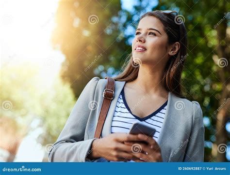 Letting Her Colleagues Know Shes On The Way An Attractive Young Woman