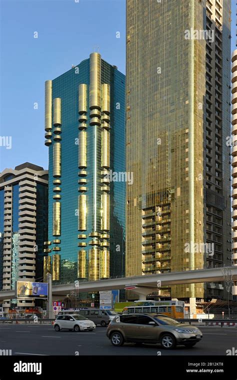 Gold shimmering facade,towers,skyscrapers,modern architecture,Sheikh ...