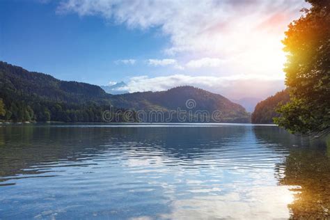 Fantastic Sunset Of Alpsee Lake In The German Alps In Hohenschwangau