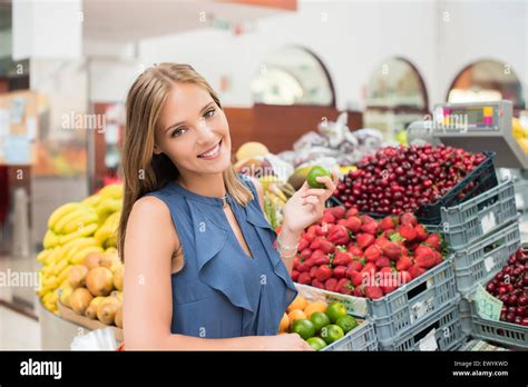 Blonde Woman Shopping Organic Veggies And Fruits Stock Photo Alamy