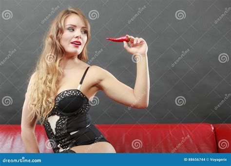 Woman Wearing Lingerie Holding Chilli Pepper Stock Photo Image Of Alluring Coquette 88656744