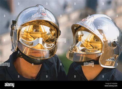 Two Firemen Wearing Futuristic Helmets Paris France Stock Photo