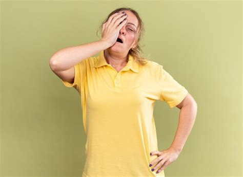 Free Photo Unhealthy Woman In Yellow Shirt Feeling Unwell Touching