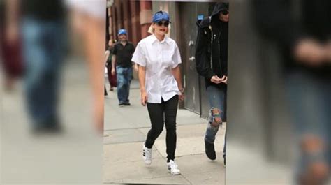 Rita Ora Struts Through New York In A Backless White Shirt Video