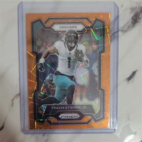 Travis Etienne Jr 2023 Panini Prizm ORANGE LAZER PRIZM Card 138