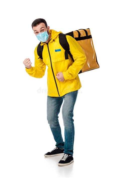 Delivery Man In Medical Mask And Backpack With Order Showing Fists