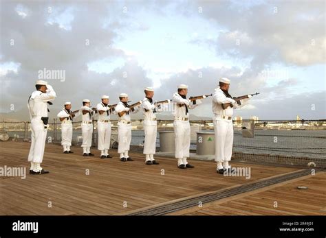 US Navy The Pearl Harbor Color Guard Renders A 21 Gun Salute Honoring