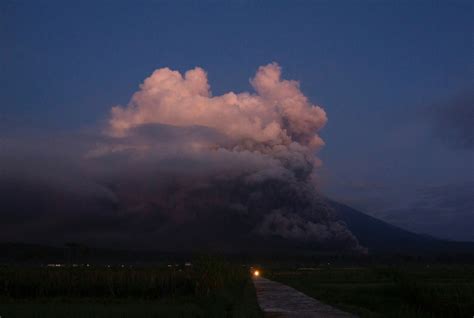 Indonesias Mount Semeru Erupts Forcing Thousands To Flee