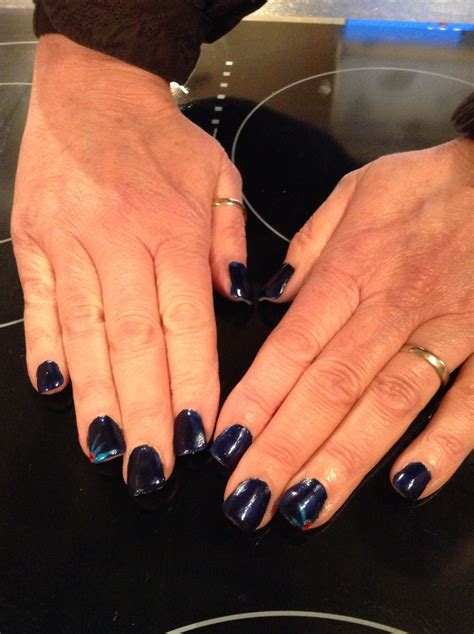 Clear Tips And Clear Acrylic Dark Blue Polish With Nail Art Fanned