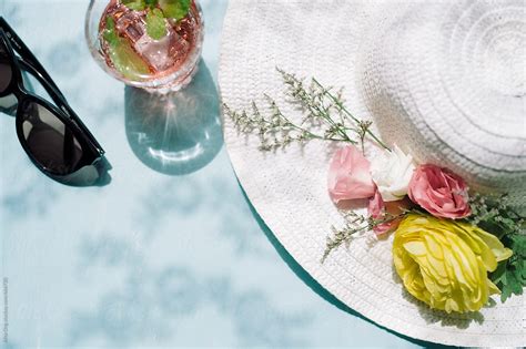 Straw Hat And Flowers By Stocksy Contributor Alita Stocksy