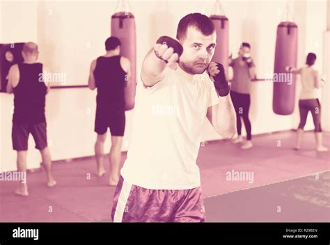 Young boy trains in the boxing gym Stock Photo - Alamy