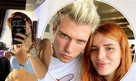 Bella Thorne Wears A Skimpy Blue Bikini Before Posing For Snaps With