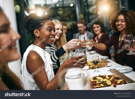 diversity dinner group people toast celebration stock photo