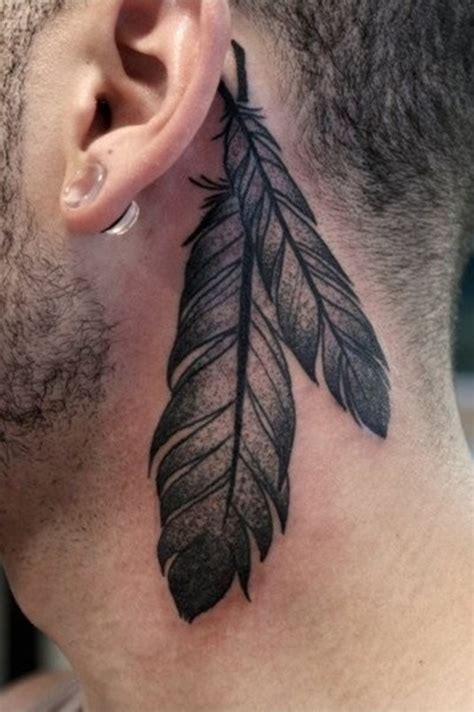 13 Beautiful Tribal Feather Tattoos