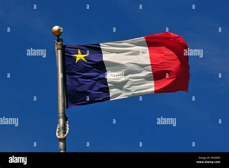 Acadian Flag Iles de la Madeleine Quebec Stock Photo - Alamy