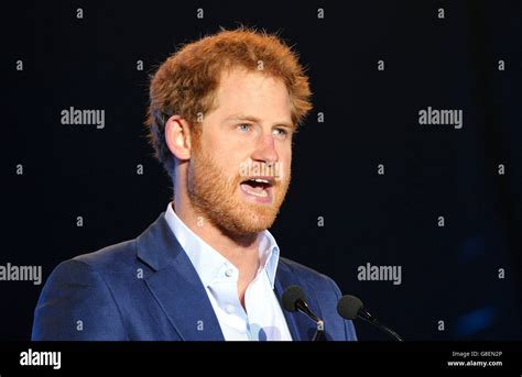 Prince Harry speaks during a concert hosted by his charity Sentebale in ...