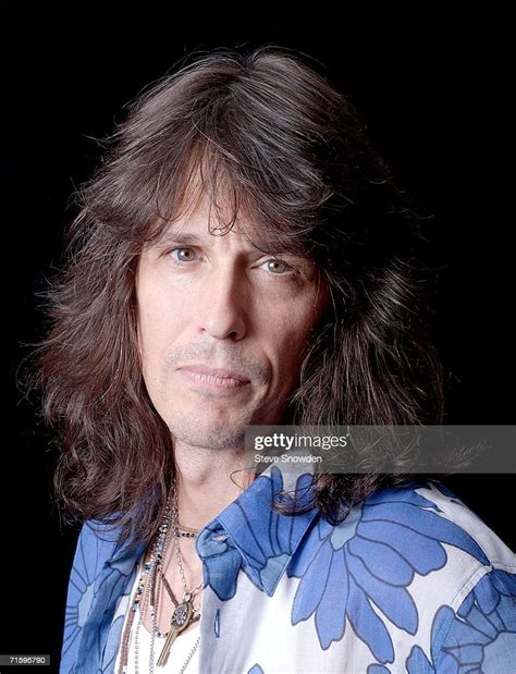 Rock group Foreigner lead singer Kelly Hansen poses backstage at ...