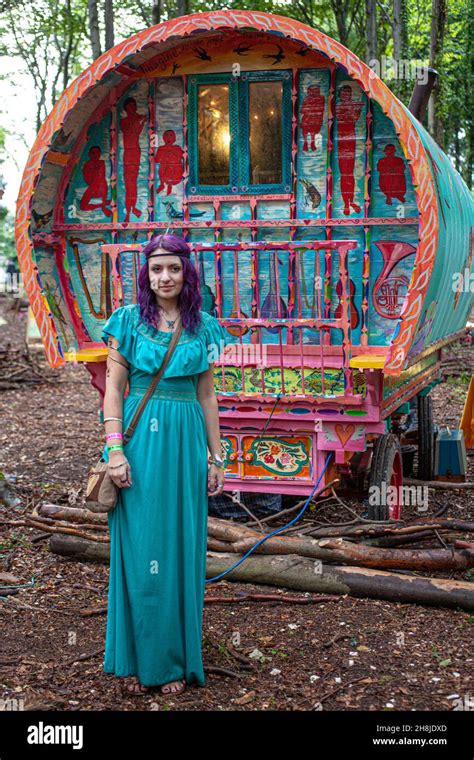 Young Bohemian Hippie Girl Standing In Front Of Traditional Gypsy