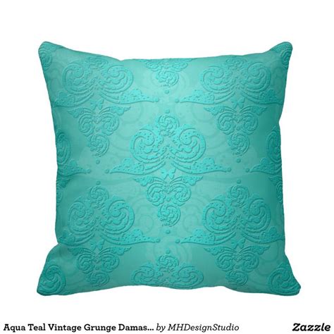 A Blue Pillow With An Intricate Design On It