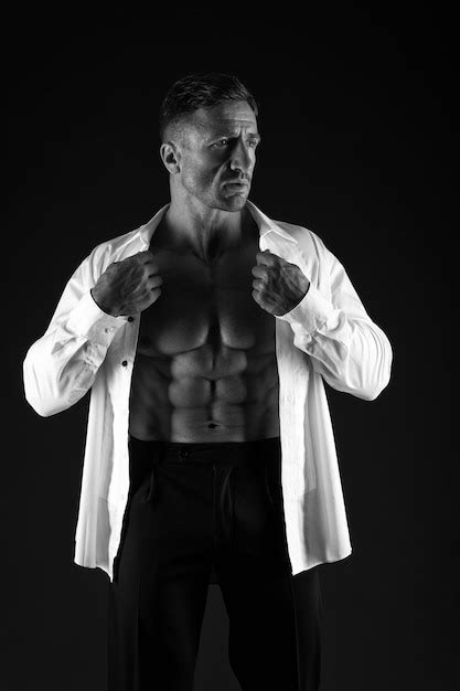 Premium Photo Elegant Man Show Six Pack Abs Torso In Open Shirt Formal Style Black Background