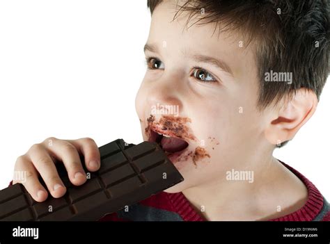 Smiling Kid Eating Chocolate Smeared Stained With Chocolate Lips