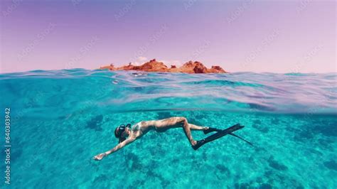 Freediver In Bikini Sexy Woman Freediver Relaxes Beneath The Water