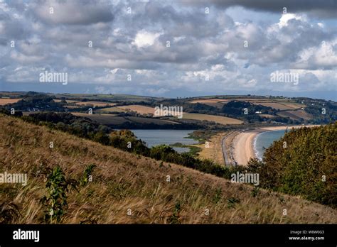 Slapton Sands Beach And The Freshwater Of Slapton Ley On The Left In