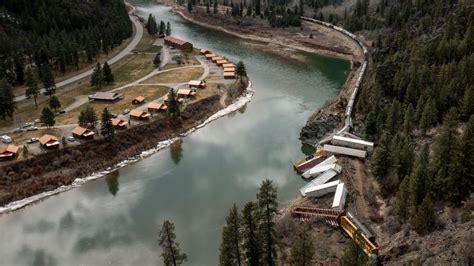 At least 25 cars of a freight train derail in western Montana | CNN