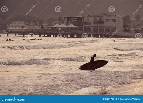 december  ita boy  man practicing surf stand  paddle sport