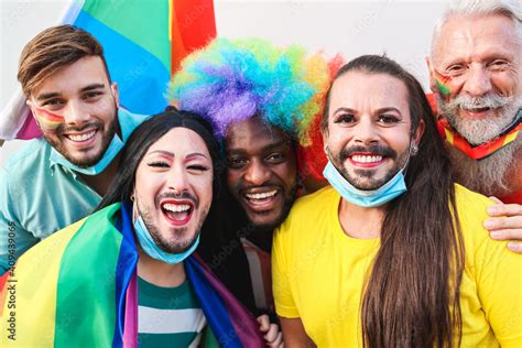 Portrait Of Multiracial Gay People Having Fun At Lgbt Pride Parade Focus On Front Faces Stock