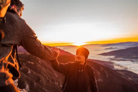 Premium Photo Hiking Team People Helping Each Other Friend Giving A