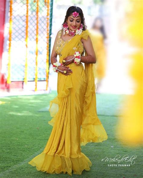 Breathtaking Haldi Dresses For Brides Yellow Saree For Day Wedding Function Yellow Outfit