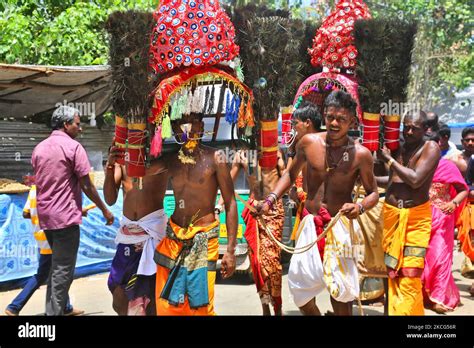 Tamil Hindu Devotees Performing The Kavadi Attam Dance During The