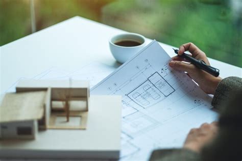 Premium Photo Midsection Of Businessman Working On Table