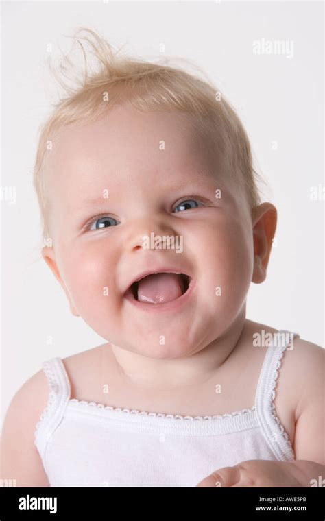 Portrait Of A Laughing Blond Baby Girl Stock Photo Alamy