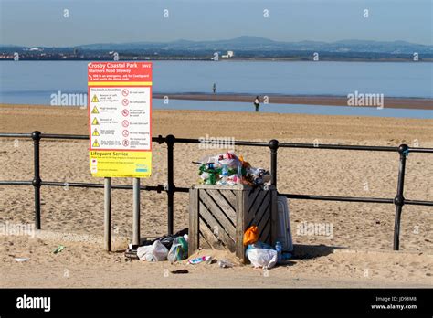 Overflowing Refuse Bins On The Promenade Of Crosby Coastal Park Near