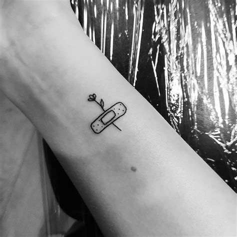 band aid tattoo minimalist - Celesta Tennant