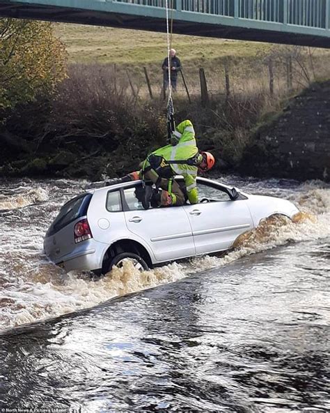 Ford Escorted Incredible Moment Hero Firefighter Abseils From Bridge