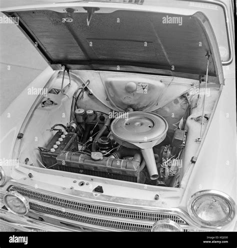 Press Photos Of The Engine Bay Of A 1966 Ford Cortina Mk 1 GT Shown