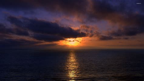 Sunset light piercing through dark clouds wallpaper - Nature wallpapers ...