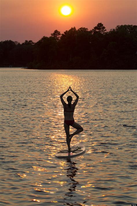 10 Reasons You Should Try Yoga On A Stand Up Paddleboard Paddle Board Yoga Paddle Boarding