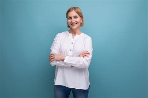 Premium Photo Attractive Blonde S Woman In White Blouse On Studio Background
