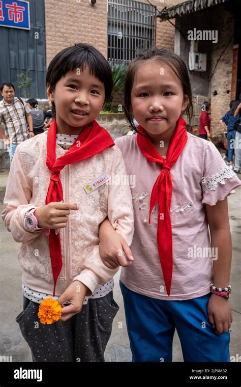 Chinese School Children wear uniform of red neck scarf Stock Photo - Alamy