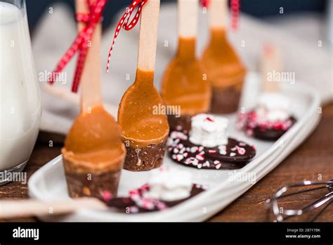 Salted Caramel Hot Cocoa Spoons On A White Tray Stock Photo Alamy