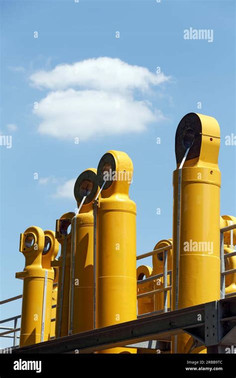 Components For Komatsu Mining Excavators Against A Blue Sky Production