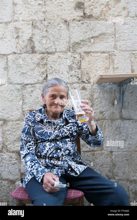 Old Lady Drinking Beer Split Croatia Stock Photo Alamy