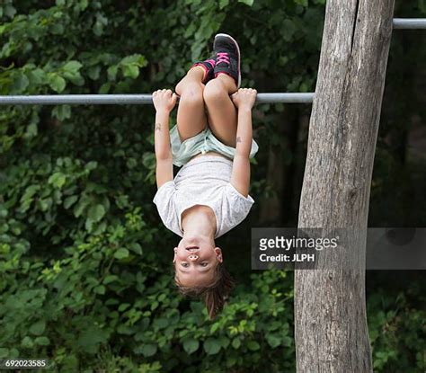 Kid Upside Down Playground Photos and Premium High Res Pictures - Getty Images