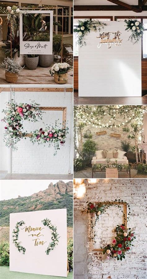 wedding decorations with flowers and greenery hanging on the wall in ...