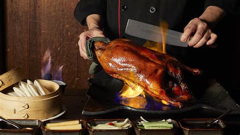 NYC S Hutong Now Serves A Flaming Peking Duck Experience