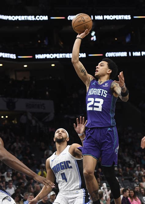 Balanced Scoring Carries Magic Over Hornets Reuters